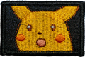 Embroidered patch of Pikachu on a black background