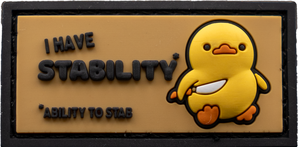 Yellow duck with text 'I HAVE STABILITY' on a brown background
